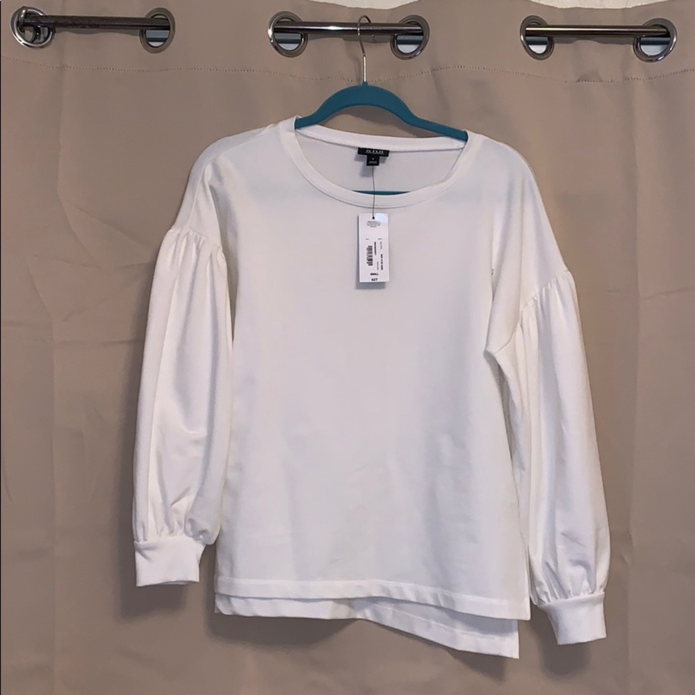 White blouse with puff sleeves